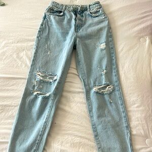 zara jeans size 2, slight stain but hardly noticeable.